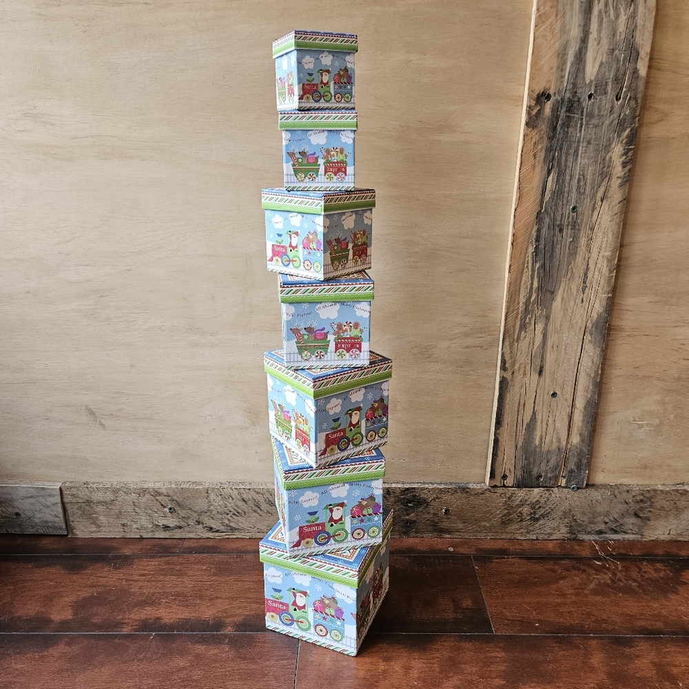 Set of 7 Stacking / Nesting Santa Christmas Gift Boxes
